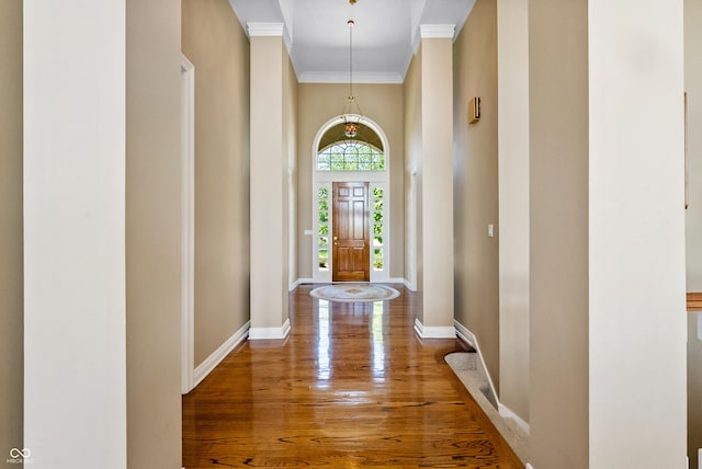 3107 Waterfront Cir, Anderson, IN 46012 - corridor featuring crown molding, wood finished floors, baseboards, and a high ceiling
