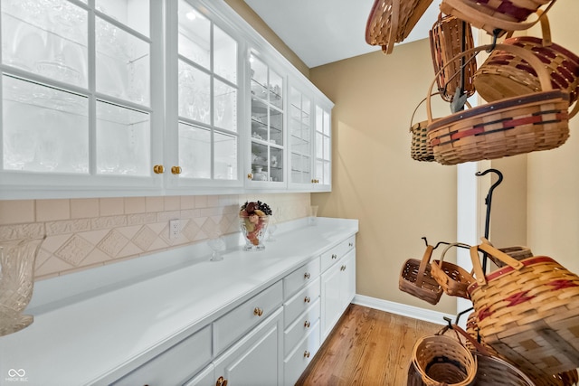 3107 Waterfront Cir, Anderson, IN 46012 - bar with light wood finished floors and baseboards