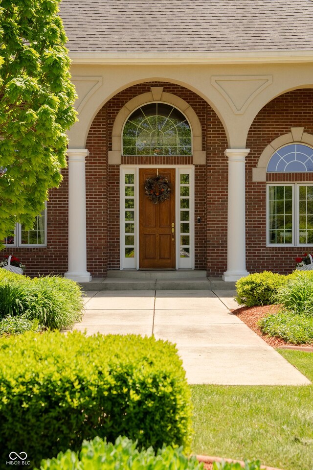 3107 Waterfront Cir, Anderson, IN 46012 - property entrance featuring brick siding and roof with shingles