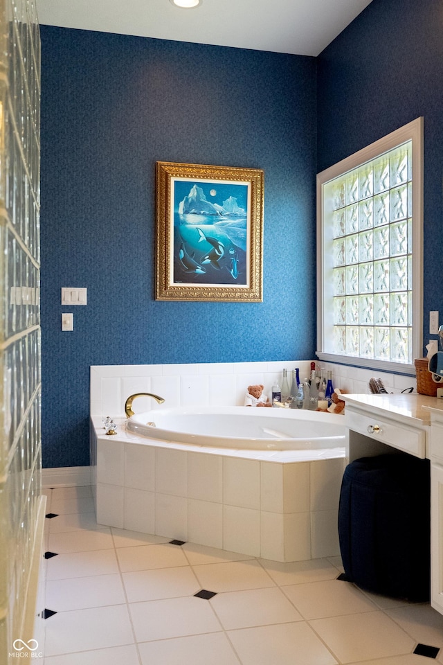 3107 Waterfront Cir, Anderson, IN 46012 - bathroom featuring tile patterned flooring and a garden tub