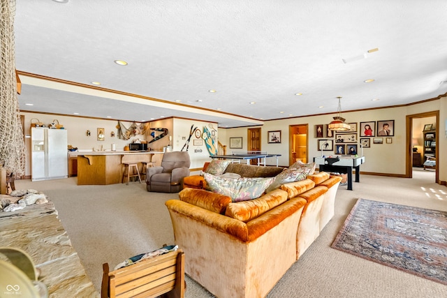 3107 Waterfront Cir, Anderson, IN 46012 - living room with light colored carpet, crown molding, recessed lighting, and baseboards