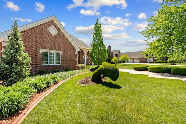 3107 Waterfront Cir, Anderson, IN 46012 - view of front facade featuring brick siding and a front lawn