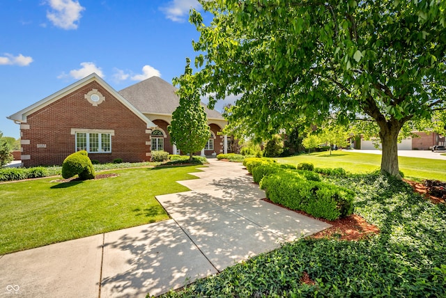 3107 Waterfront Cir, Anderson, IN 46012 - view of front of home featuring brick siding and a front yard
