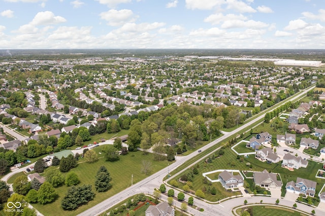 aerial overview of property's location with nearby suburban area