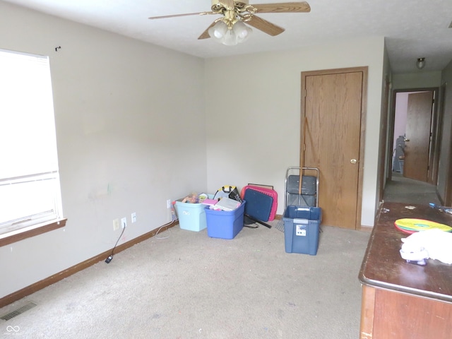 470 N Pine St, Morgantown, IN 46160 - unfurnished bedroom with carpet, baseboards, and a ceiling fan