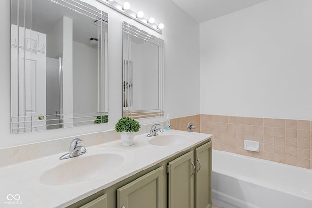 bathroom featuring a bath and double vanity