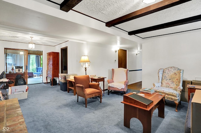 living room featuring beamed ceiling, carpet, and a textured ceiling