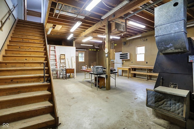 below grade area with a workshop area and stairs