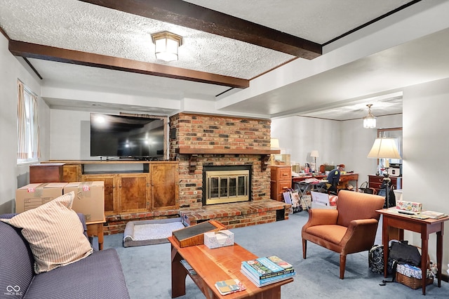 living room featuring carpet floors, beamed ceiling, a textured ceiling, and a brick fireplace