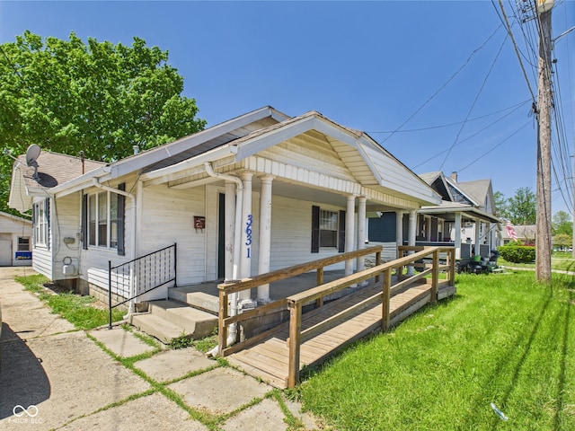 3631 Columbus Ave, Anderson, IN 46013 - view of front of property with a porch and a front yard