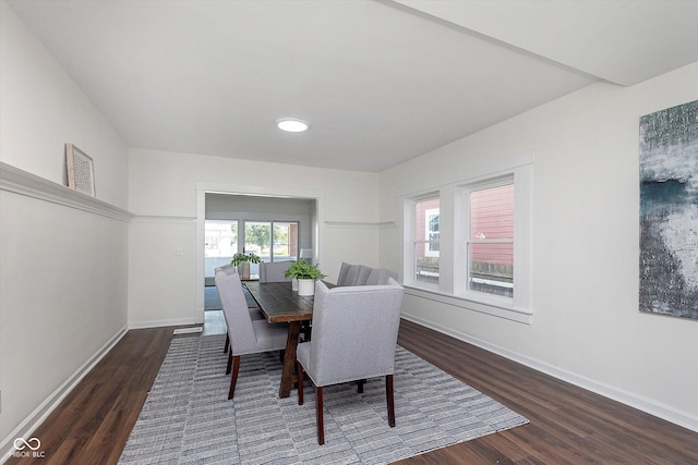 2442 Guilford Ave, Indianapolis, IN 46205 - dining space featuring dark wood finished floors and baseboards