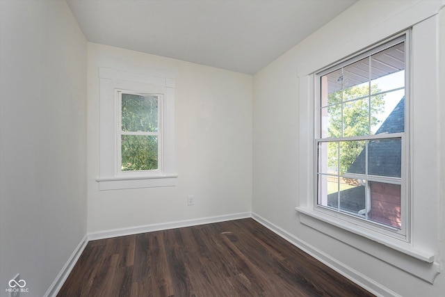 2442 Guilford Ave, Indianapolis, IN 46205 - unfurnished room featuring dark wood-style flooring and baseboards