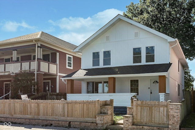 2442 Guilford Ave, Indianapolis, IN 46205 - view of front of home featuring a porch and roof with shingles