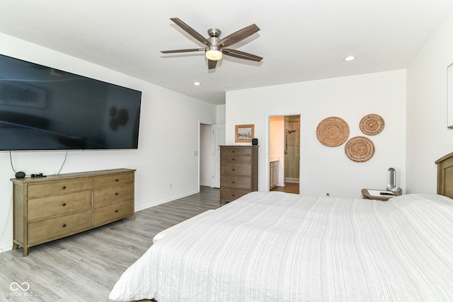 89 Kinnick Dr, Greenwood, IN 46143 - bedroom with light wood-style flooring, recessed lighting, baseboards, ceiling fan, and ensuite bath
