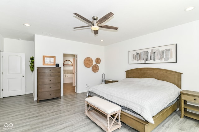 89 Kinnick Dr, Greenwood, IN 46143 - bedroom with light wood-style flooring, recessed lighting, baseboards, a ceiling fan, and connected bathroom
