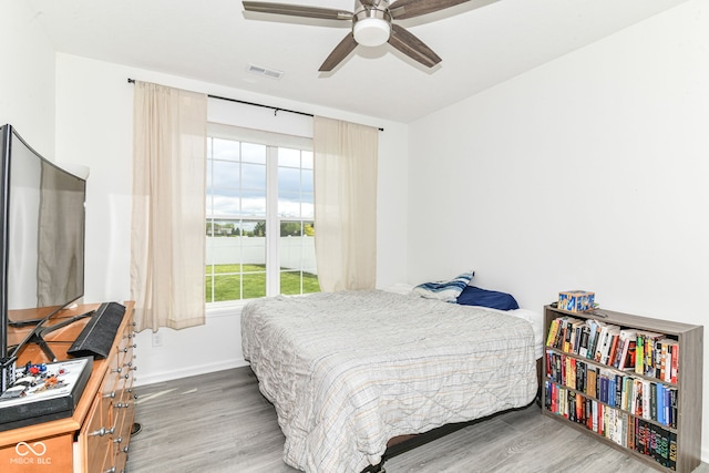 89 Kinnick Dr, Greenwood, IN 46143 - bedroom featuring wood finished floors, baseboards, and a ceiling fan