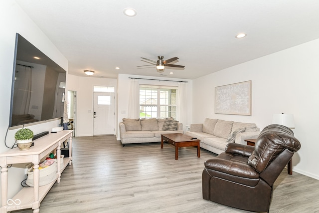 89 Kinnick Dr, Greenwood, IN 46143 - living room featuring light wood-style floors, ceiling fan, recessed lighting, and baseboards