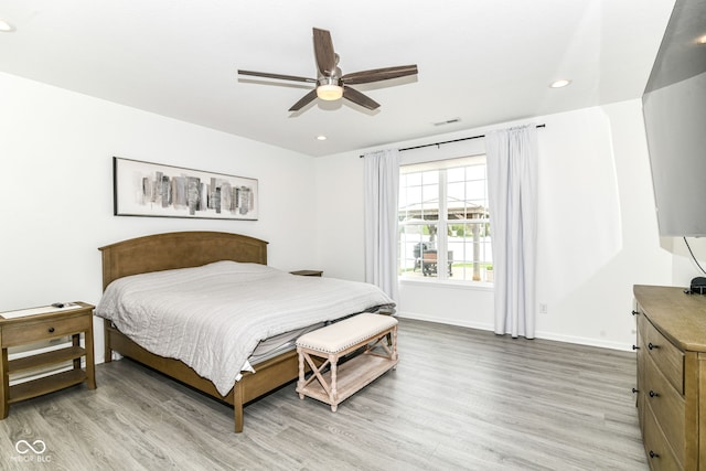89 Kinnick Dr, Greenwood, IN 46143 - bedroom with light wood finished floors, recessed lighting, baseboards, and ceiling fan