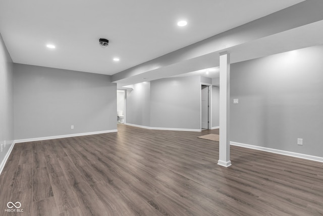 6305 Norwich Dr, Brownsburg, IN 46112 - finished basement with baseboards, dark wood-type flooring, and recessed lighting
