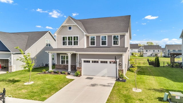 6305 Norwich Dr, Brownsburg, IN 46112 - view of front of house with covered porch, a garage, driveway, a residential view, and a shingled roof