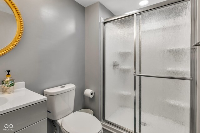 6305 Norwich Dr, Brownsburg, IN 46112 - full bath featuring a shower stall, vanity, and toilet