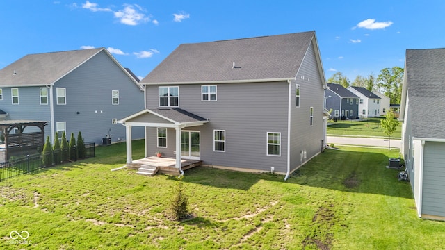 6305 Norwich Dr, Brownsburg, IN 46112 - rear view of property with a deck, central AC unit, and a shingled roof