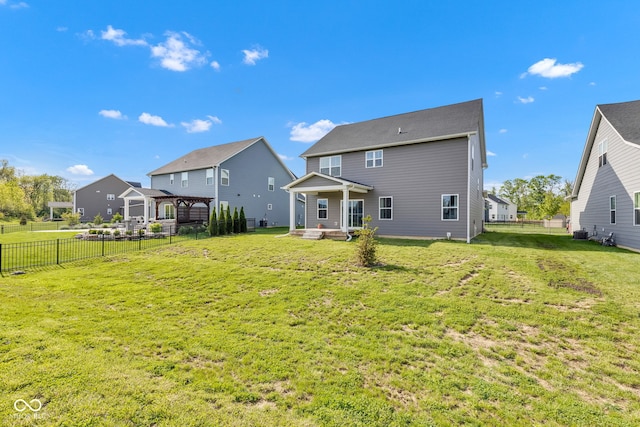6305 Norwich Dr, Brownsburg, IN 46112 - back of house featuring a pergola and a residential view