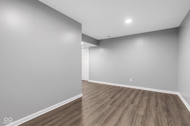 6305 Norwich Dr, Brownsburg, IN 46112 - finished below grade area with dark wood finished floors, baseboards, and recessed lighting