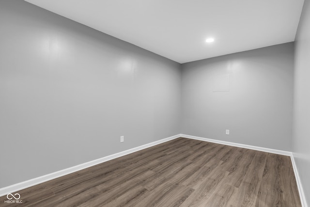 6305 Norwich Dr, Brownsburg, IN 46112 - empty room with dark wood-style floors, baseboards, and recessed lighting