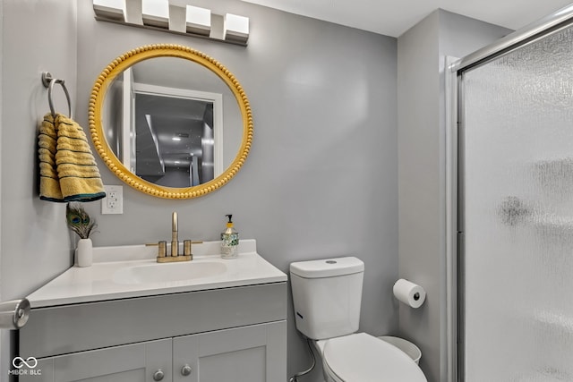 6305 Norwich Dr, Brownsburg, IN 46112 - bathroom featuring a stall shower, vanity, and toilet