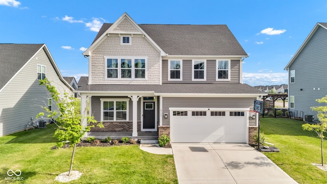 6305 Norwich Dr, Brownsburg, IN 46112 - craftsman inspired home featuring an attached garage, a porch, driveway, a front yard, and roof with shingles