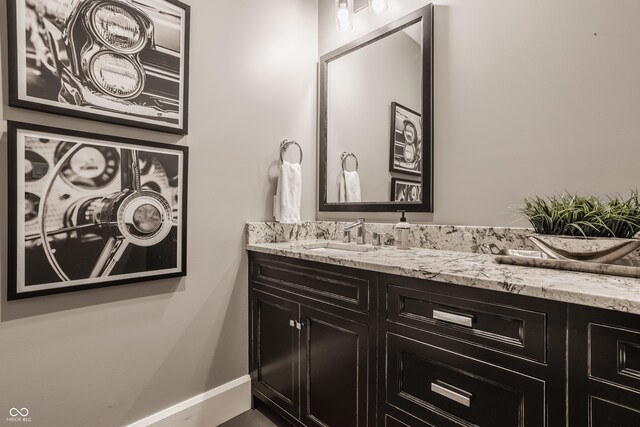 6734 W Stonegate Dr, Zionsville, IN 46077 - bathroom with vanity and baseboards