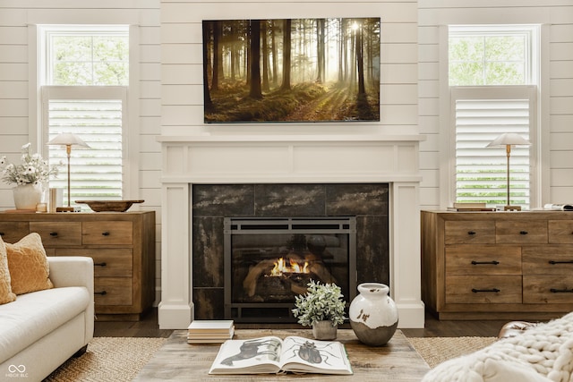 6734 W Stonegate Dr, Zionsville, IN 46077 - living room with wood finished floors, a fireplace, and plenty of natural light