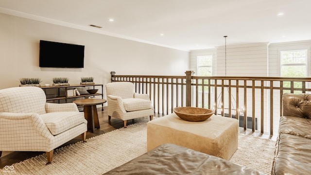 6734 W Stonegate Dr, Zionsville, IN 46077 - sitting room featuring plenty of natural light, ornamental molding, wood finished floors, and recessed lighting