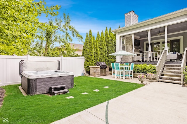 6734 W Stonegate Dr, Zionsville, IN 46077 - view of yard featuring a hot tub, a patio area, and a ceiling fan