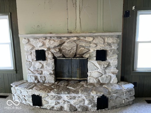 3209 Mounds Rd, Anderson, IN 46016 - detailed view of a stone fireplace and wooden walls