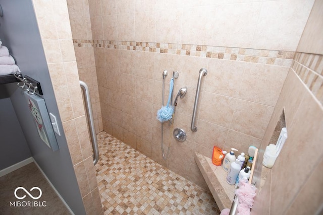 full bathroom featuring a shower stall