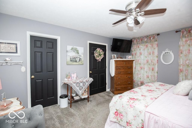 carpeted bedroom with a ceiling fan