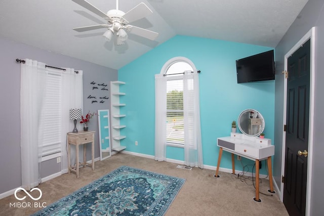 bedroom featuring lofted ceiling, carpet, baseboards, and ceiling fan