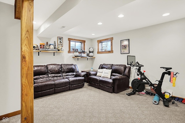 carpeted living room featuring recessed lighting and baseboards
