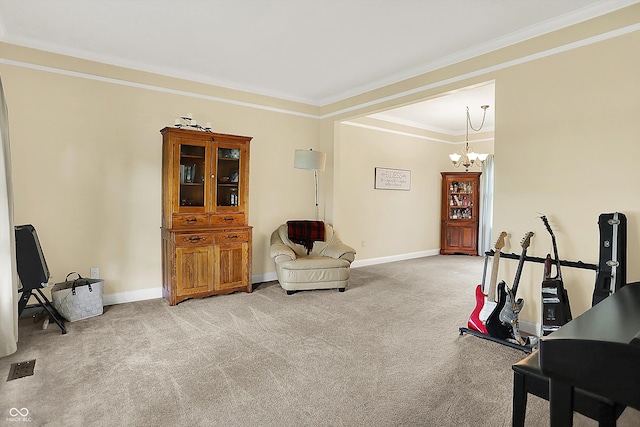 sitting room featuring carpet flooring, crown molding, a chandelier, and baseboards
