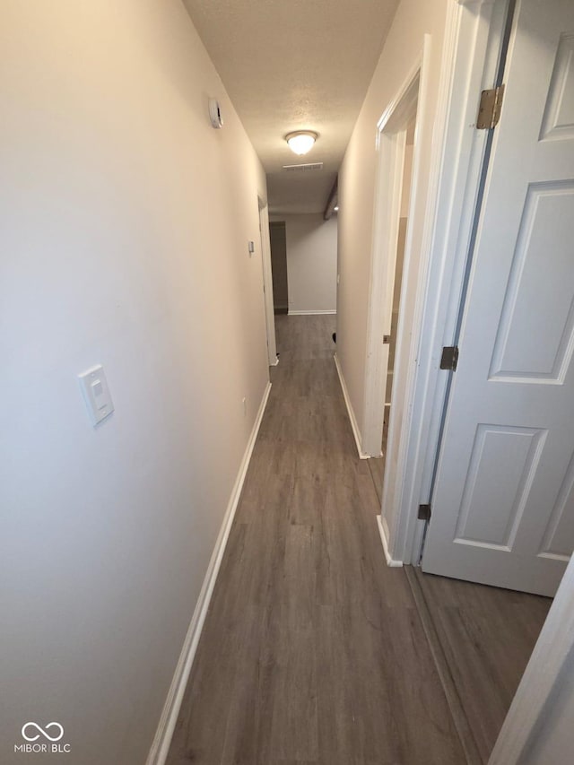 885 S Norkay St, North Vernon, IN 47265 - hall featuring wood finished floors and baseboards