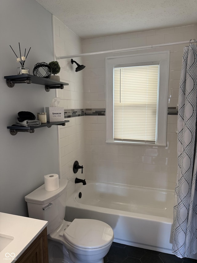 3720 W 16th St, Indianapolis, IN 46222 - bathroom with shower / bath combo with shower curtain, toilet, a textured ceiling, vanity, and tile patterned flooring