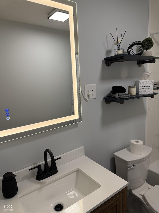 3720 W 16th St, Indianapolis, IN 46222 - full bath with vanity, a shower, and toilet