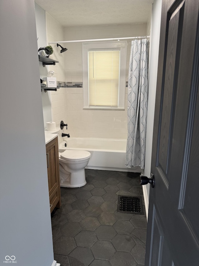 3720 W 16th St, Indianapolis, IN 46222 - full bath featuring shower / bathtub combination with curtain, toilet, vanity, and tile patterned flooring