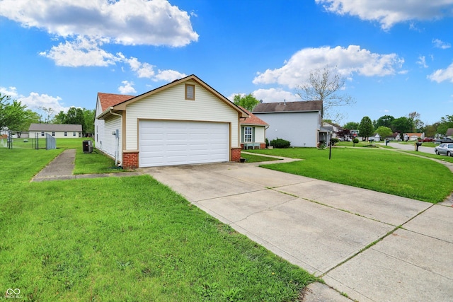 view of home's exterior with concrete driveway, a lawn, and an attached garage