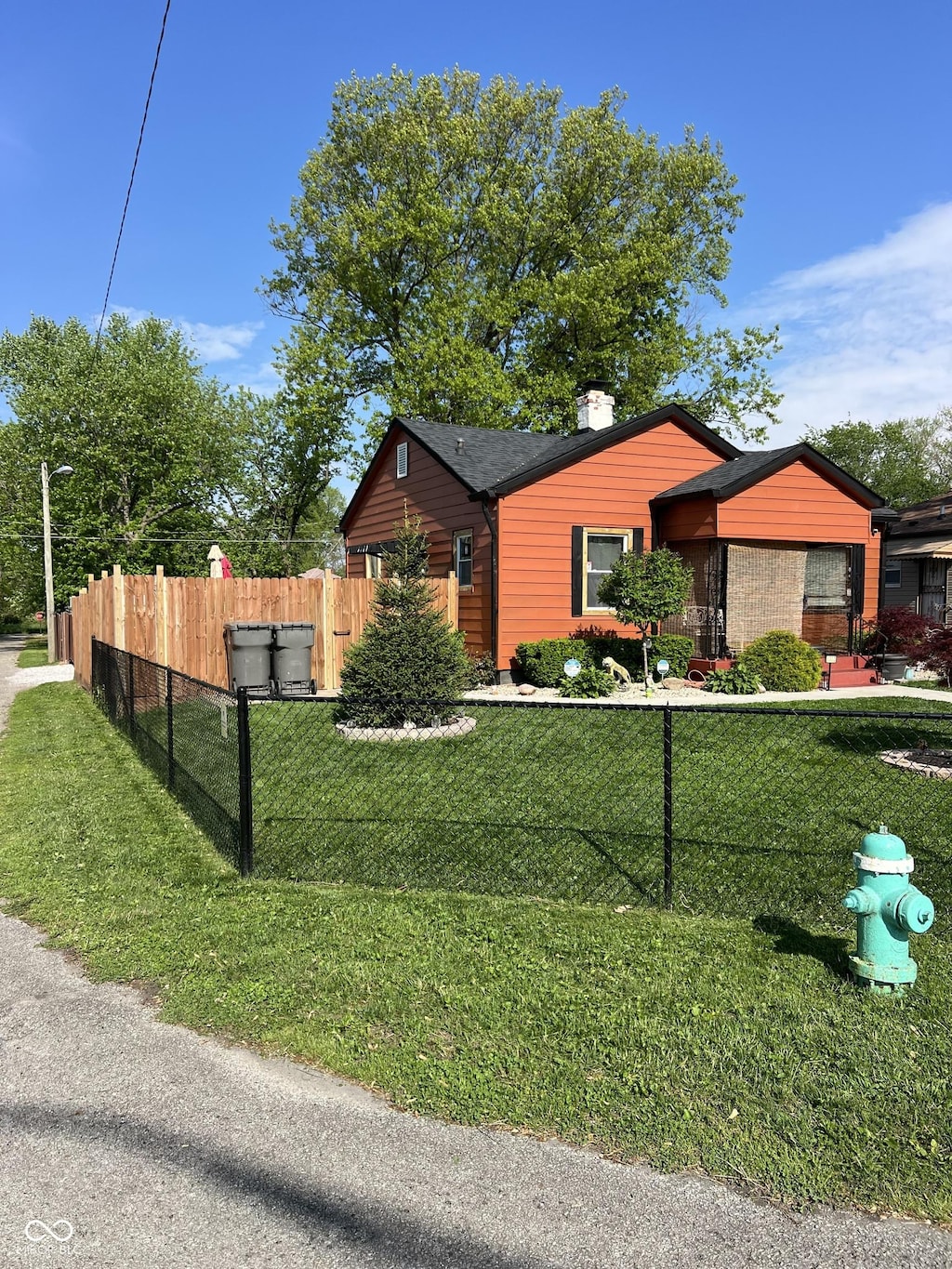 view of side of property featuring a chimney