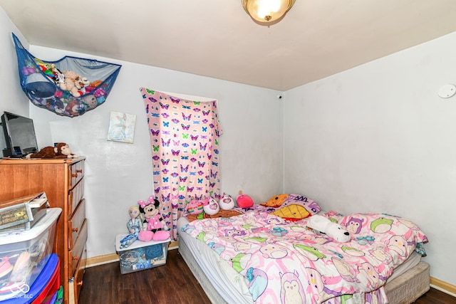 3302 N Gladstone Ave, Indianapolis, IN 46218 - bedroom featuring wood finished floors and baseboards