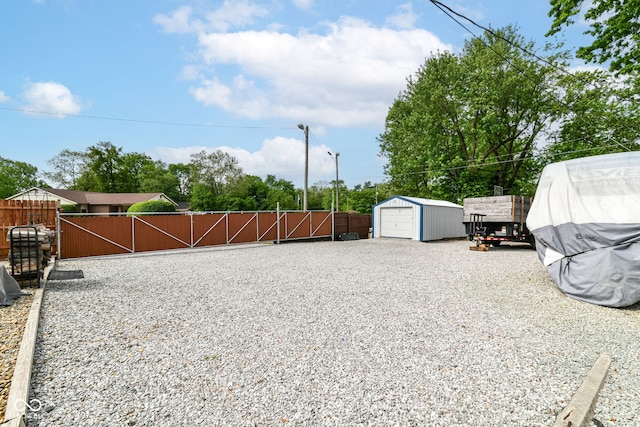 3302 N Gladstone Ave, Indianapolis, IN 46218 - view of yard with fence and an outdoor structure