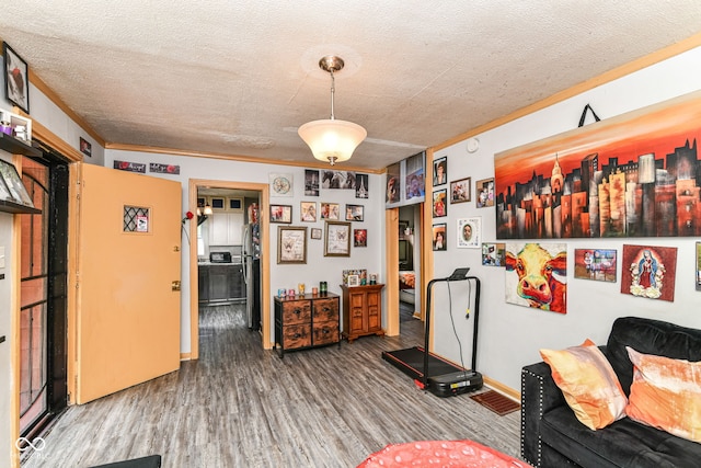 3302 N Gladstone Ave, Indianapolis, IN 46218 - kitchen featuring wood finished floors, a textured ceiling, and baseboards
